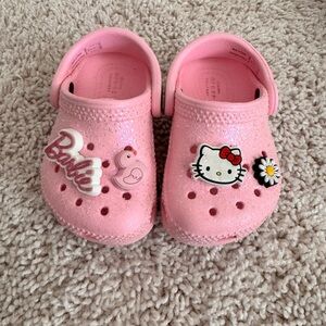CROCS Pink Slippers with Ventilation Holes and Decorative Charms